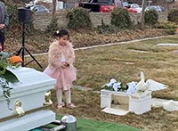 girl in pink at memorial